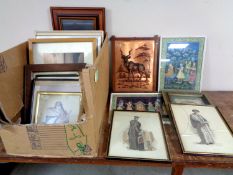 A box of assorted pictures and prints, copper relief panel depicting a gazelle, Indian school,