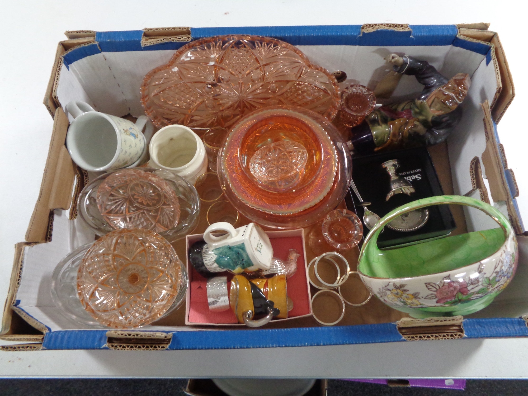 A box containing miscellaneous to include pink glass dressing table set, ornaments,