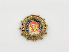 An antique 18ct gold and enamel brooch 'S M V PAUL RAINER', 7.4g, diameter 32 mm.