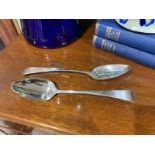 A pair of Newcastle hallmarked silver serving spoons, dated 1801.