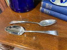 A pair of Newcastle hallmarked silver serving spoons, dated 1801.