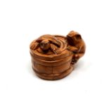 A carved Chinese hardwood netsuke - Turtle and frog in barrel