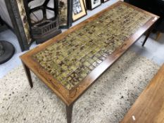 A Continental tile topped mid century tiled coffee table