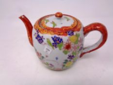 A 20th century Japanese hand painted teapot