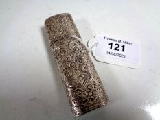 A continental silver scent bottle with embossed foliate decoration, length 8cm.