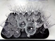 A tray of cut glass and lead crystal drinking glasses