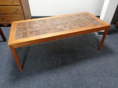 A mid 20th century continental teak tile topped coffee table