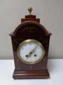 An Edwardian inlaid mahogany bracket clock with enamel dial,