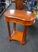 A kidney shaped two tier occasional table fitted a drawer