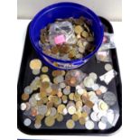 A tub containing a large quantity of world coins, British pre-decimal coins, world cup tokens etc.