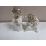 Two Lladro figures of cherubs.