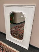 A 3' x 2' white framed mirror