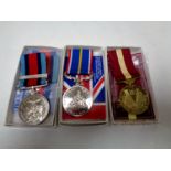 Three replica commemorative medals to include Normandy Campaign medal,