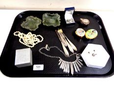 A tray containing silver and costume jewellery, two enamelled pill boxes,