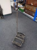 A cast iron boot scraper