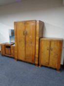 A three piece 20th century Art Deco bedroom suite comprising of double door wardrobe,