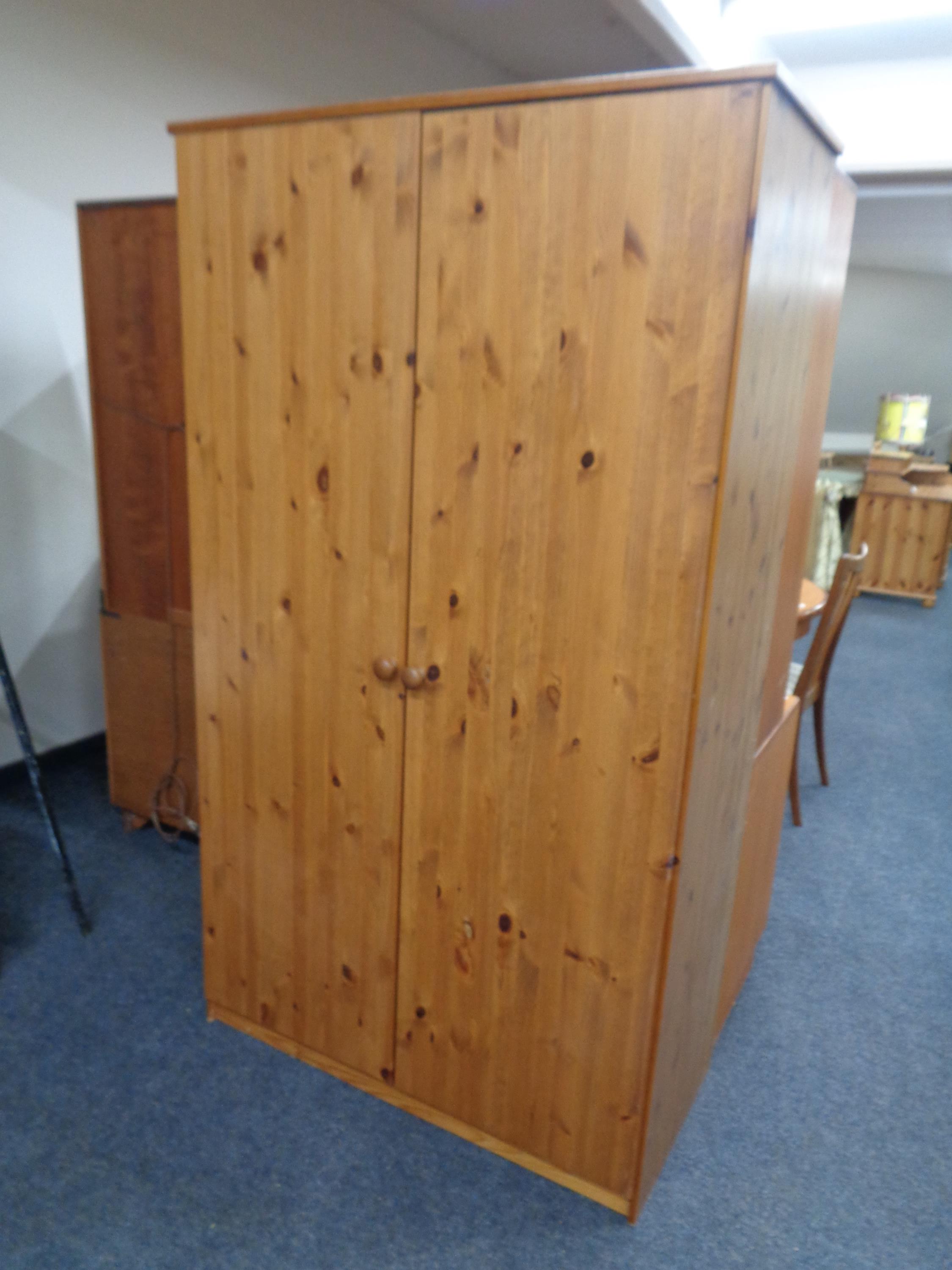 A pine double door wardrobe