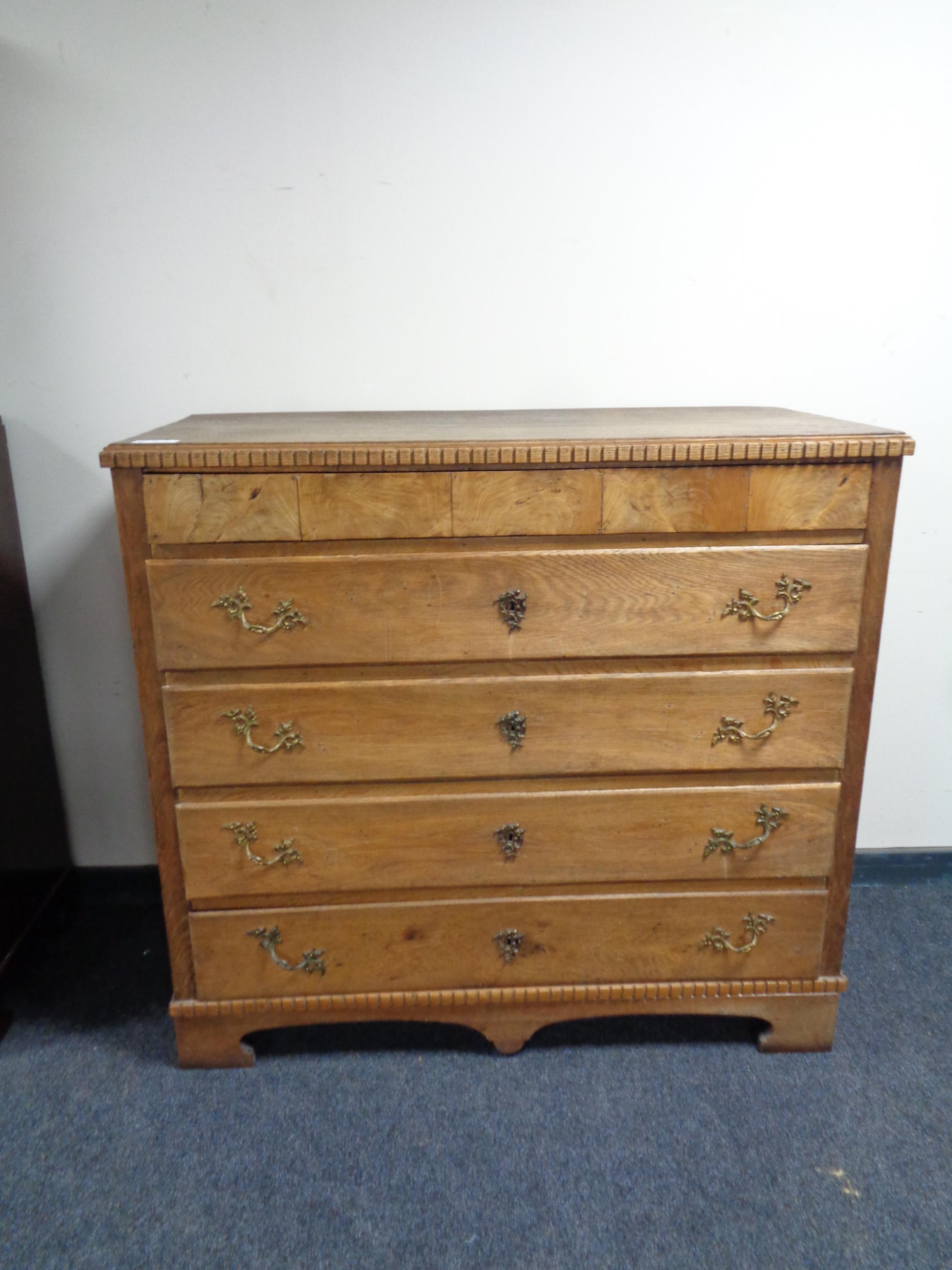 A 19th century oak five drawer chest