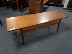 A mid 20th century teak coffee table