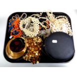 A tray of costume jewellery to include beaded necklaces, assorted lady's wristwatches,