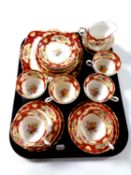 A tray of twenty one pieces of Paragon bone tea china