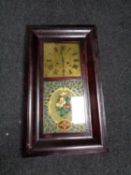 A 19th century American cased eight day wall clock