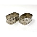 A pair of silver napkin rings.