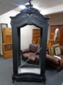 A double sided French style shop display cabinet