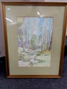 A watercolour of a river through a wooded landscape, signed Simpson, dated 1987,