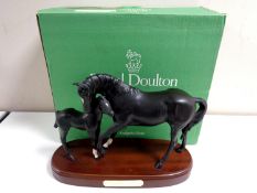 A Royal Doulton Black Beauty and Foal on plinth, boxed.
