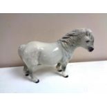 A Beswick Shetland Pony.