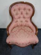 A reproduction Victorian style lady's chair in buttoned fabric