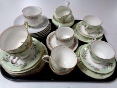 A tray of tea china to include a twenty piece Aynsley Valencia bone china tea service
