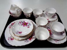 A twenty-one piece Royal Vale bone chain tea service