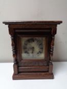 An Edwardian oak cased bracket clock with silvered dial