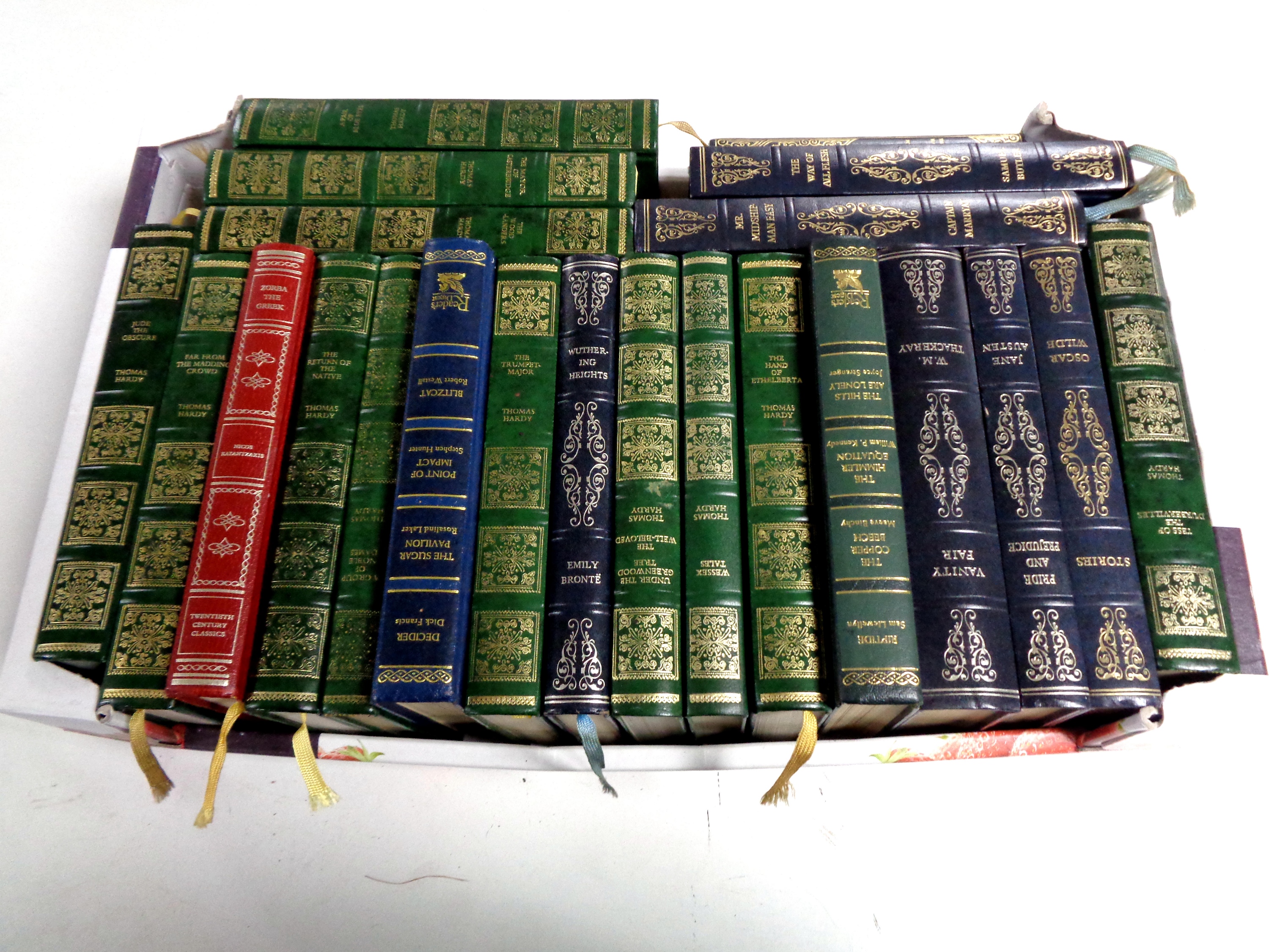 A box of Reader's Digest leather bound volumes