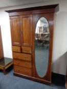 A 19th century inlaid mahogany compactum wardrobe