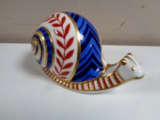 A Royal Crown Derby snail paperweight