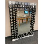 A contemporary all glass mirror 100 cm x 140 cm