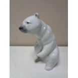 A Lladro figure of a polar bear.