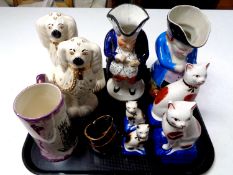 A tray of antique and later china, Toby jugs, Staffordshire dogs,
