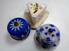 A Wedgwood Jasperware blue and white lidded cheese dish together with two further cheese dishes