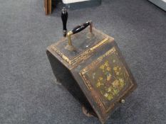 A 19th century hand painted tin coal receiver with shovel