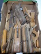 A box of vintage wood working planes