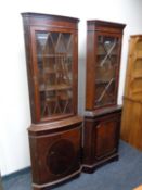 Two mahogany corner display cabinets