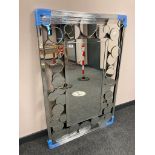 An all glass round mirror 120 cm x 80 cm