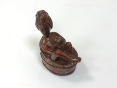 A carved Chinese hardwood netsuke - Erotic nude bathing