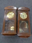 Two 20th century oak cased eight day wall clocks (a/f)