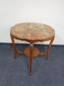 A shaped Edwardian occasional table