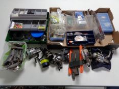 Two boxes of fishing equipment to include assorted reels, line, weights and other tackle,